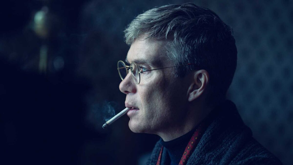 Cillian Murphy as Tommy Shelby smoking a cigarette in Peaky Blinders The Immortal Man