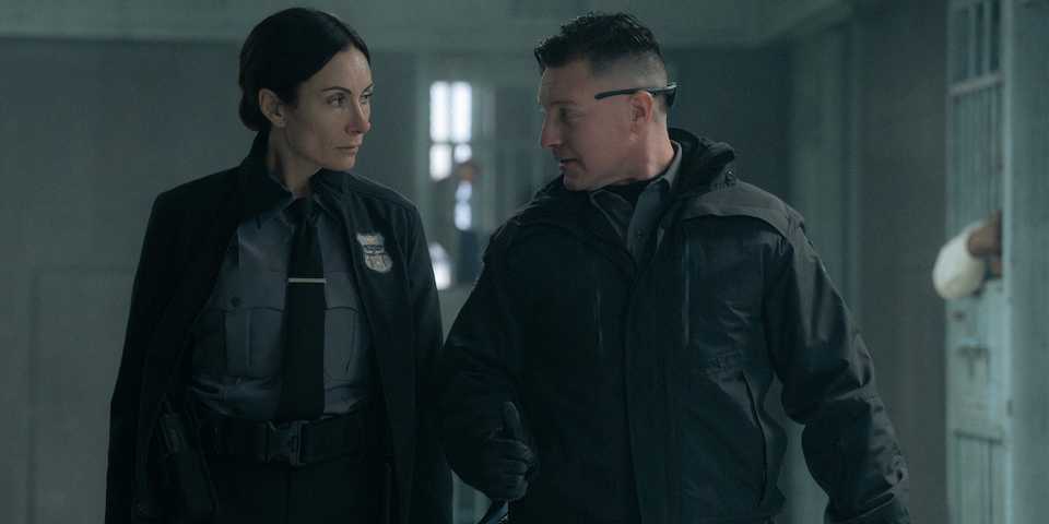 Lane Garrison's Carney talking with Laura Benanti's Cindy in Mayor of Kingstown season 4