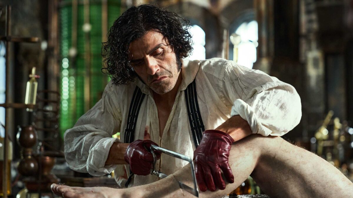 Oscar Isaac's Frankenstein cutting a leg in Frankenstein