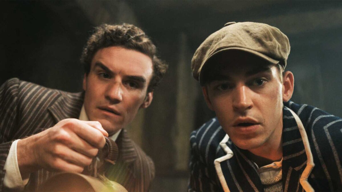 Sherlock and Moriarty looking on in shock in Young Sherlock episode 1