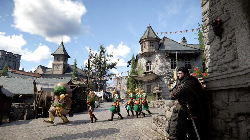 Medieval village scene with costumed characters.