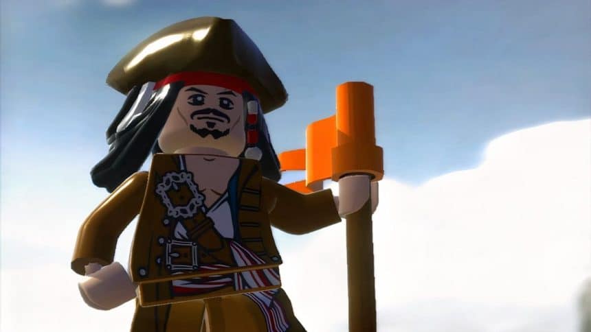 Lego pirate figure holding a telescope.