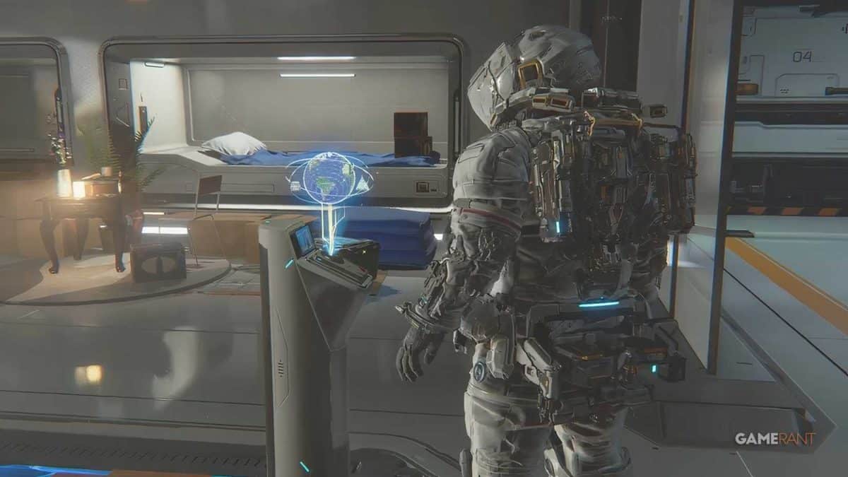 Astronaut examining holographic globe in quarters.